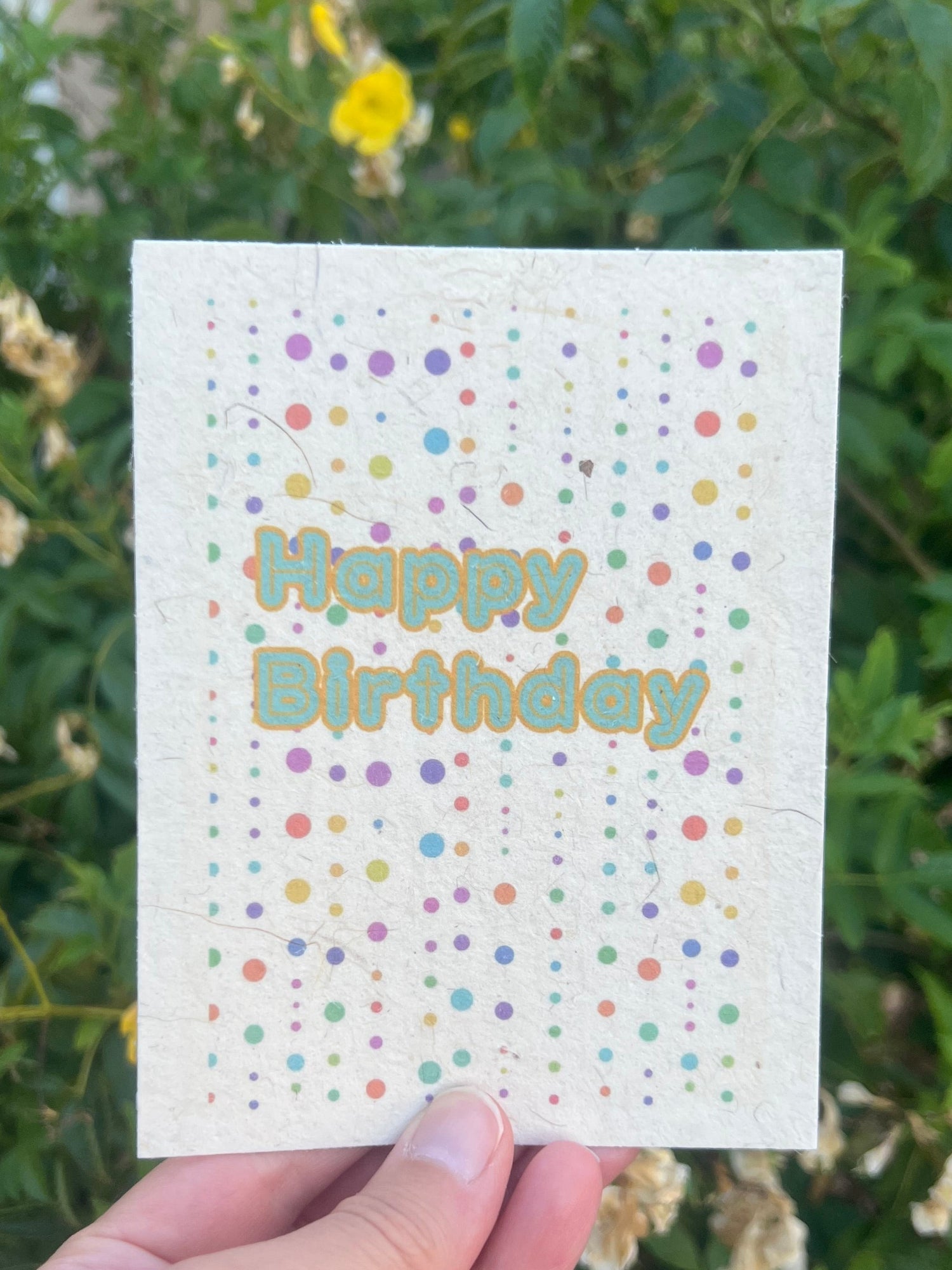 eco friendly plantable card with happy birthday on it with dots party themed