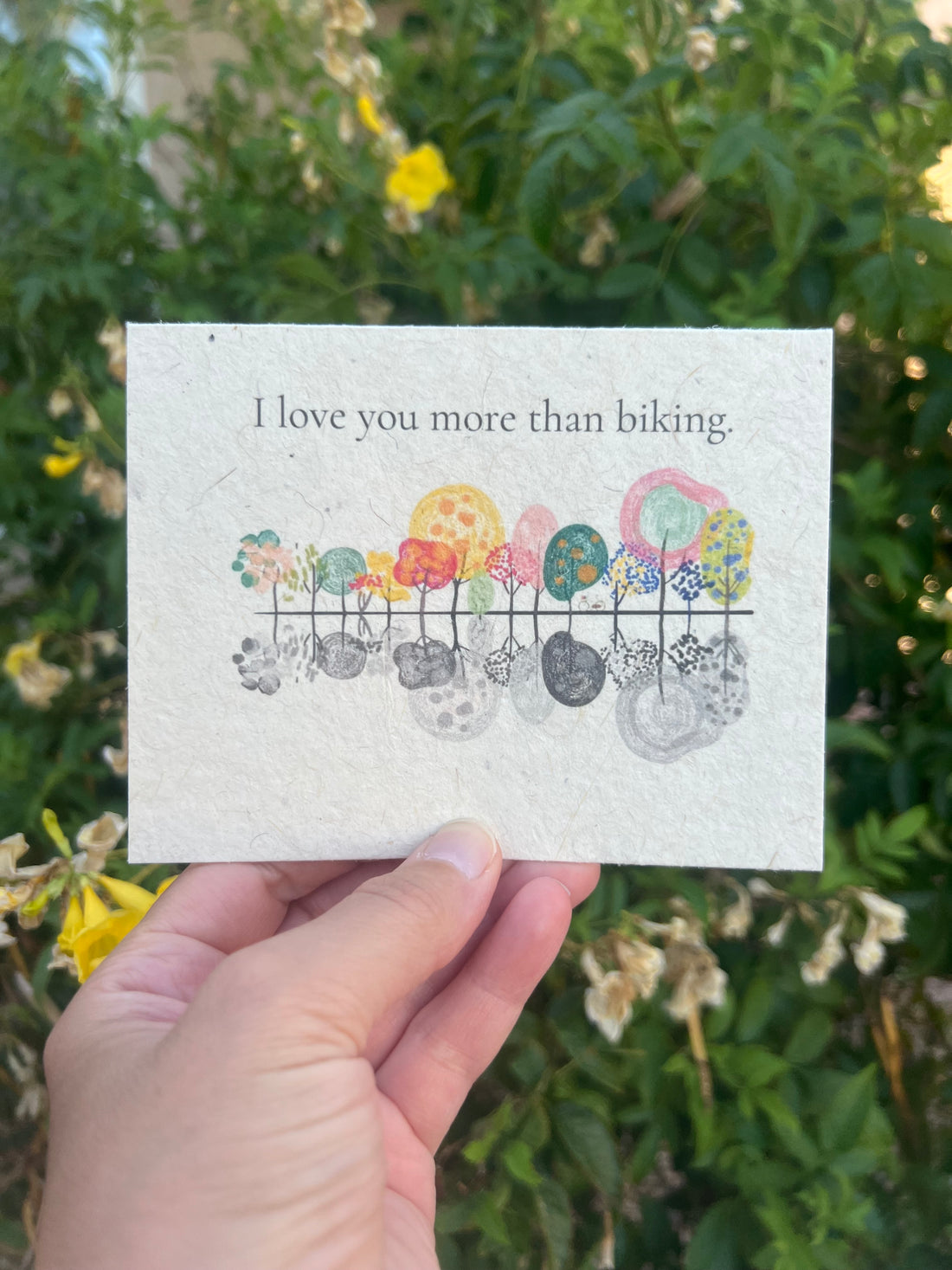 Tree-free seed paper greeting card with colorful trees on it. 